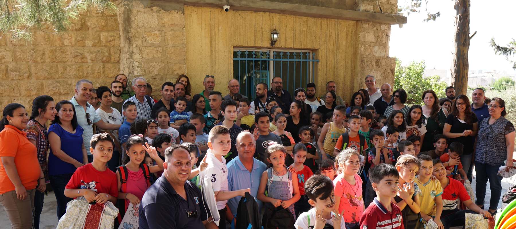 Nazareth Village staff bless refugee children with back-to-school bundles in Jordan